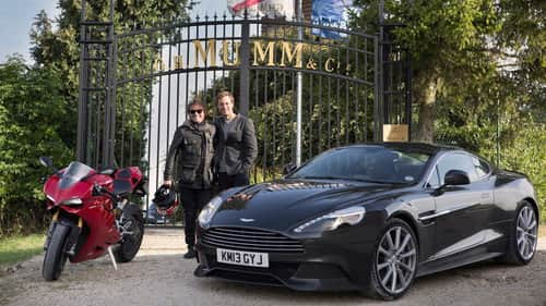 Aston Martin v. Ducati, Champagne and Swords