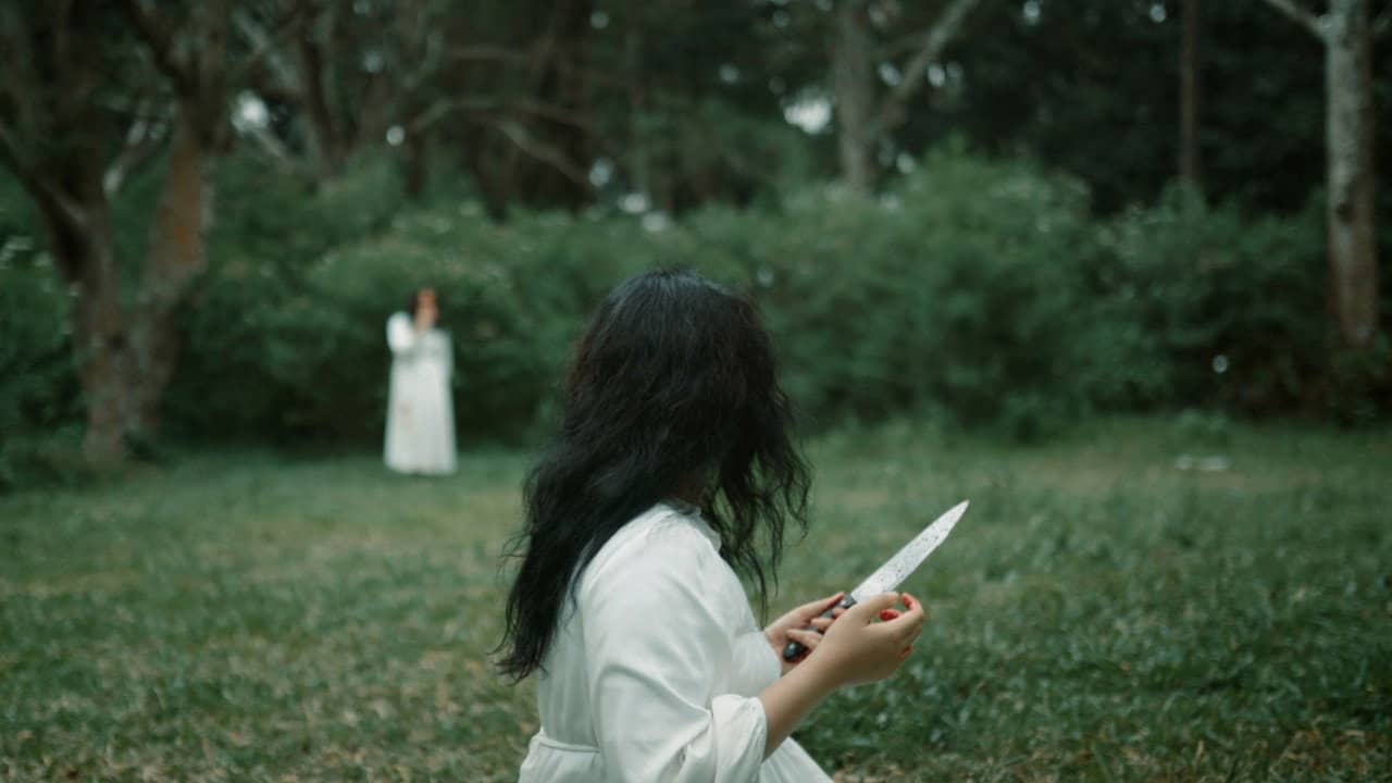 The Woman In White backdrop