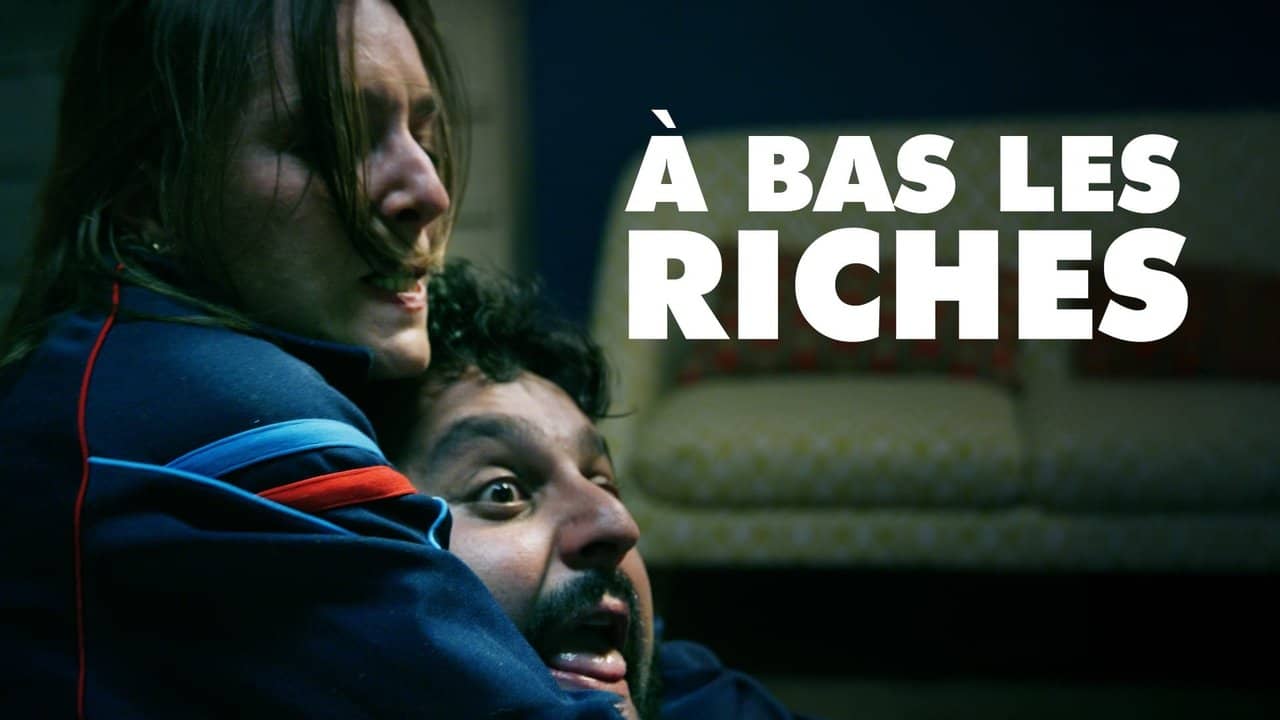 A BAS LES RICHES backdrop