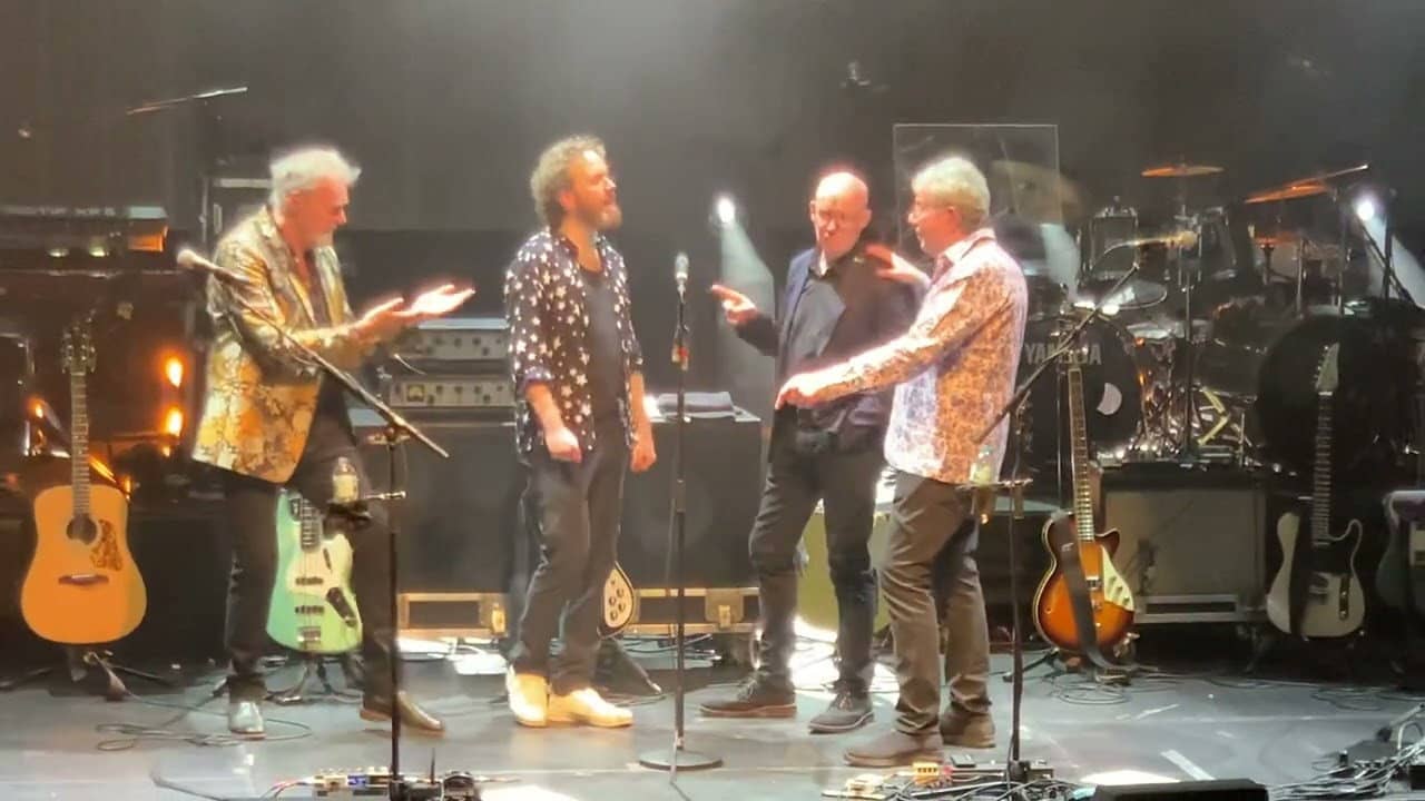10cc - Clever Clogs. Live in Concert backdrop